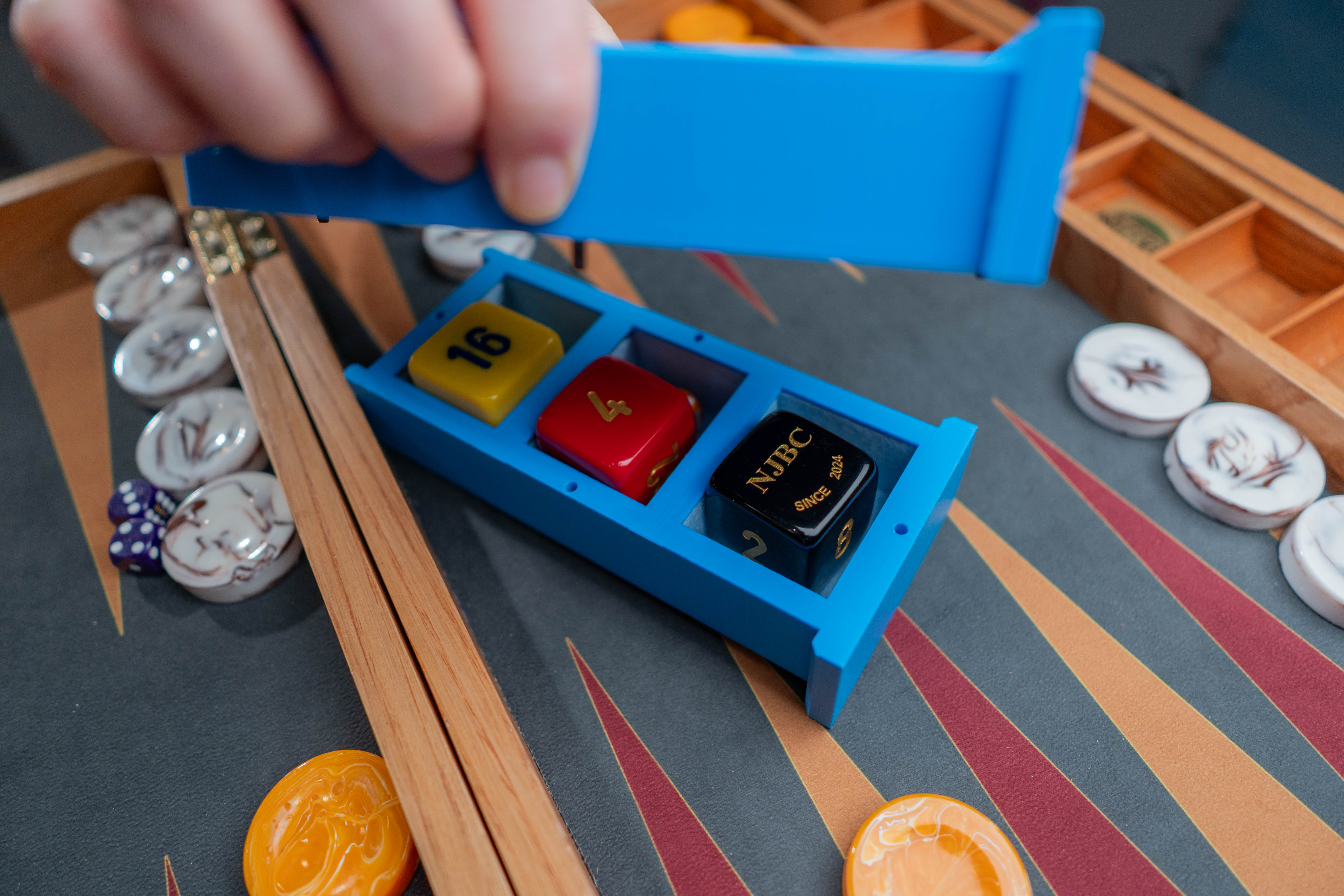 Cube Tower open on backgammon board